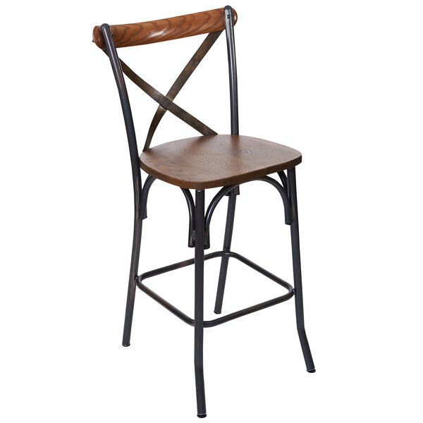 A BFM Seating Henry clear coated steel counter height stool with a wooden X-back and seat.
