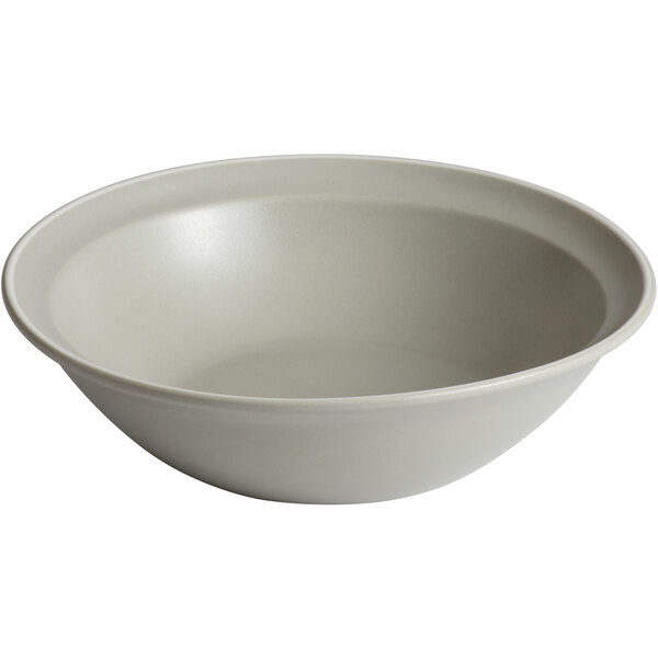A white porcelain Libbey salad bowl with a white background.