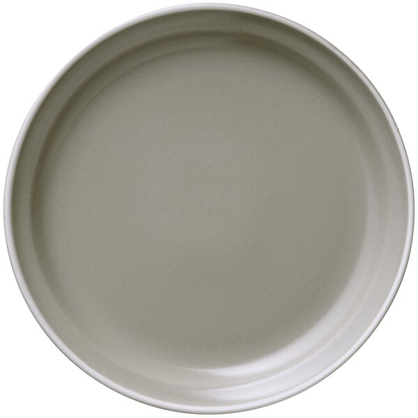 A matte mint cream Libbey porcelain plate with a white rim.
