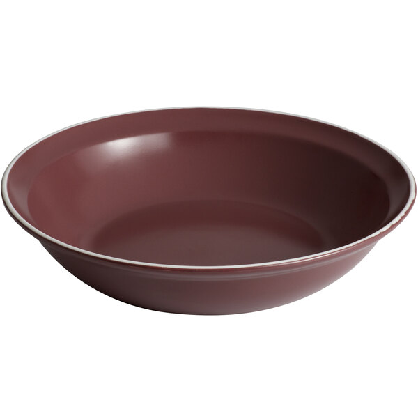 A matte mulberry bowl with a white rim.