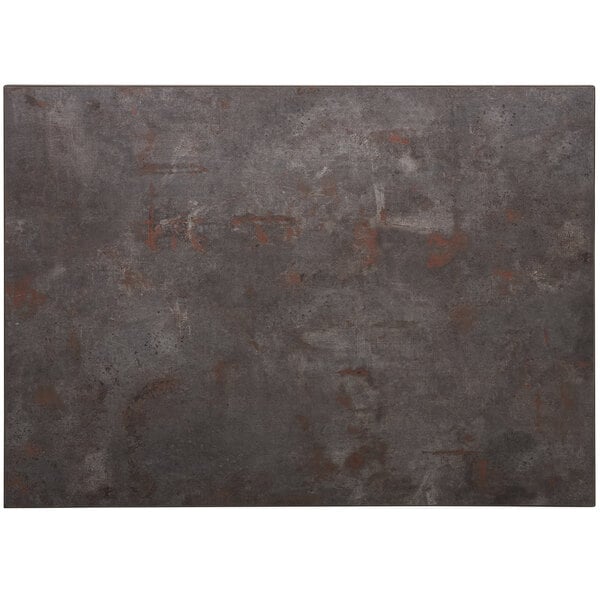 A rectangular metal table top with a grey and red rustic finish.