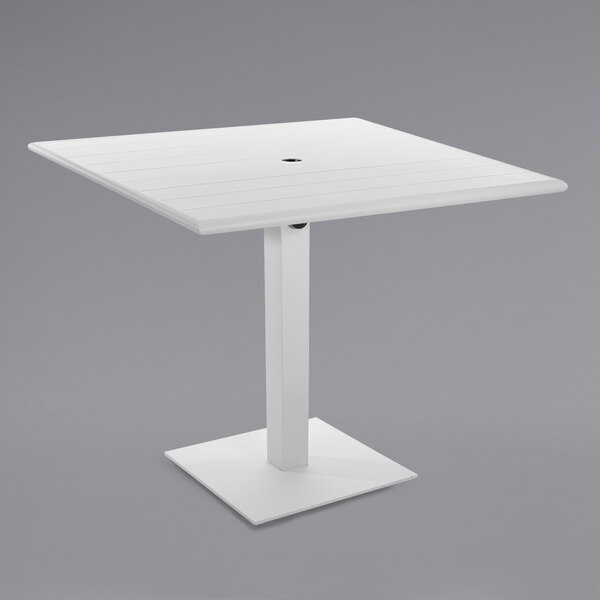 A white square BFM Seating table with a square metal base.
