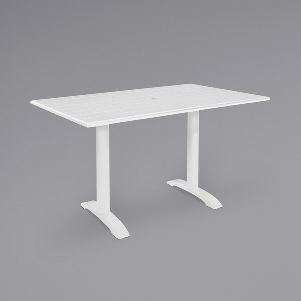 A white BFM Seating Bali-Beachcomber bar height table with cross base.
