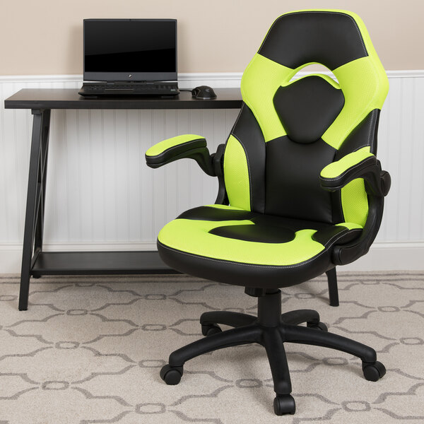 A neon-green and black Flash Furniture office chair with a black laptop.