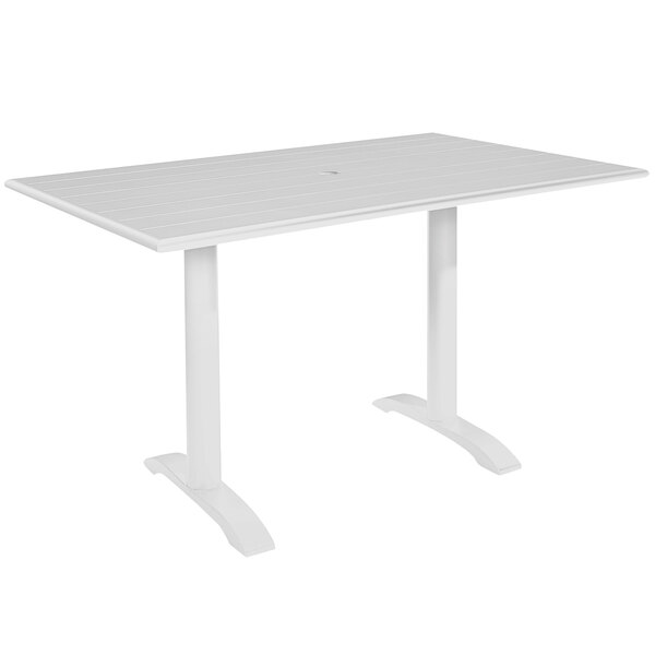 A white BFM Seating Bali dining table with a square metal base.