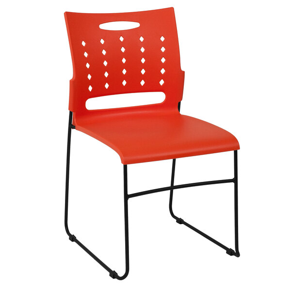 A red plastic Flash Furniture stack chair with black sled base legs.