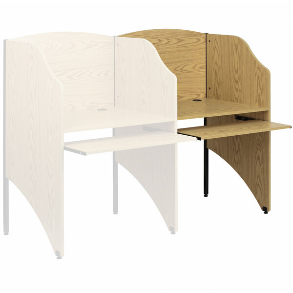 An oak Flash Furniture study carrel with a white and brown surface.