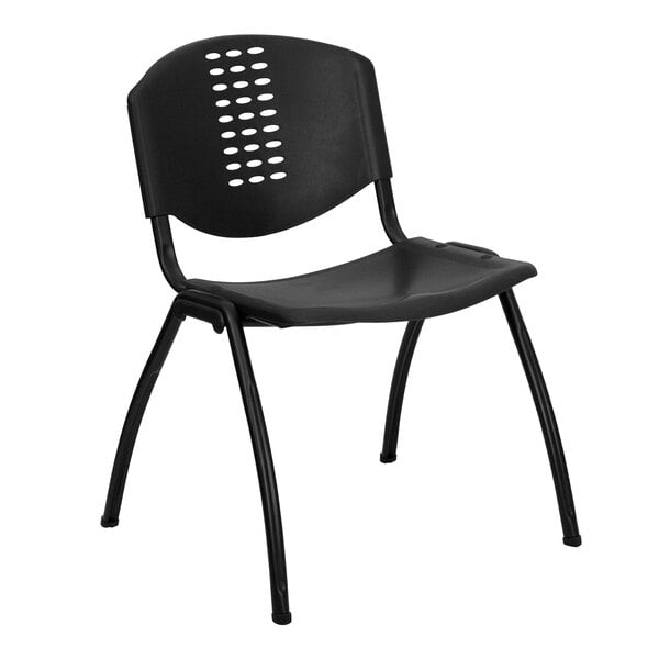 A black plastic Flash Furniture stack chair with a cutout back.