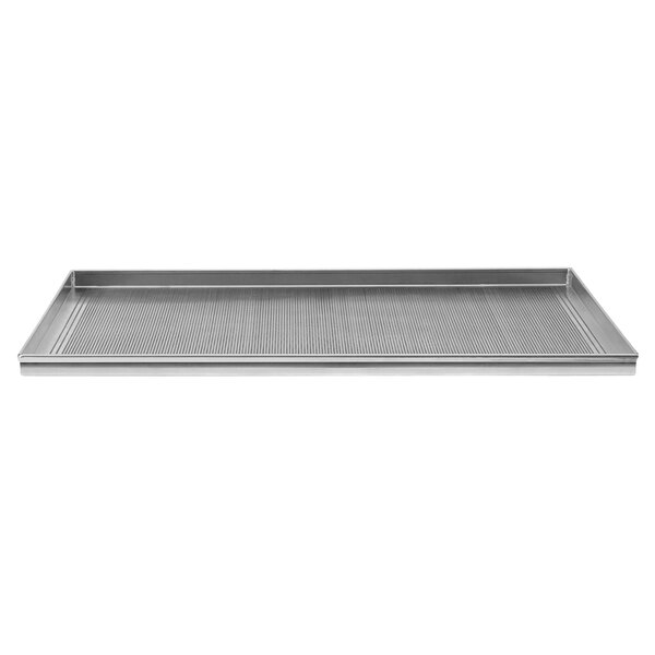 An Axis perforated aluminum tray on a metal surface.