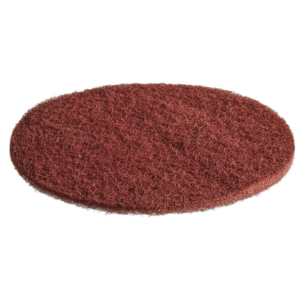 A close-up of a brown MotorScrubber scouring pad.