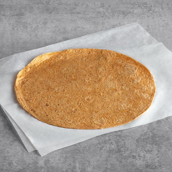 A Mission 12" tortilla on a white surface.