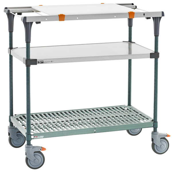 A white Metro cart with two shelves and wheels.