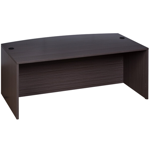 A dark wood laminate bow front desk shell.