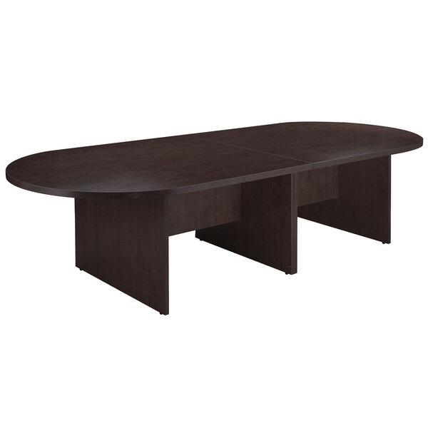 A Boss mocha laminate oval conference table with two legs.