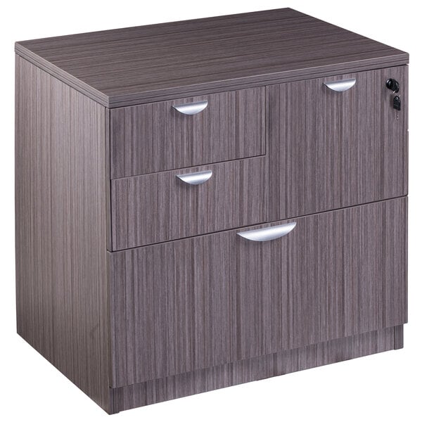 A Boss Driftwood laminate combination lateral file cabinet with three drawers.