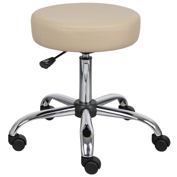 A beige Boss Office adjustable stool with wheels.