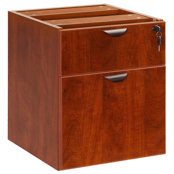 A Boss cherry laminate hanging pedestal letter file cabinet with two drawers and a key.