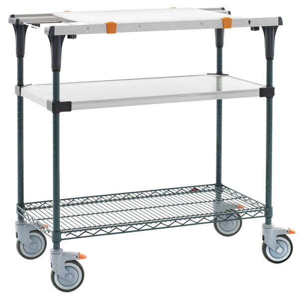 A Metro stainless steel cart with two shelves.