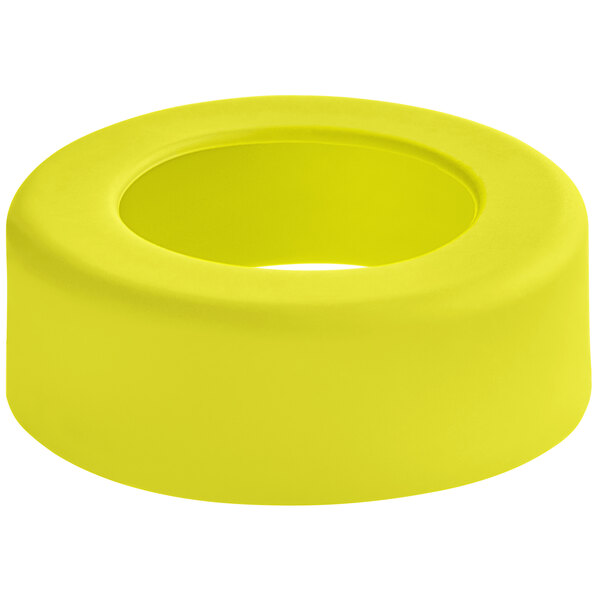 A yellow silicone band with a hole in the middle.