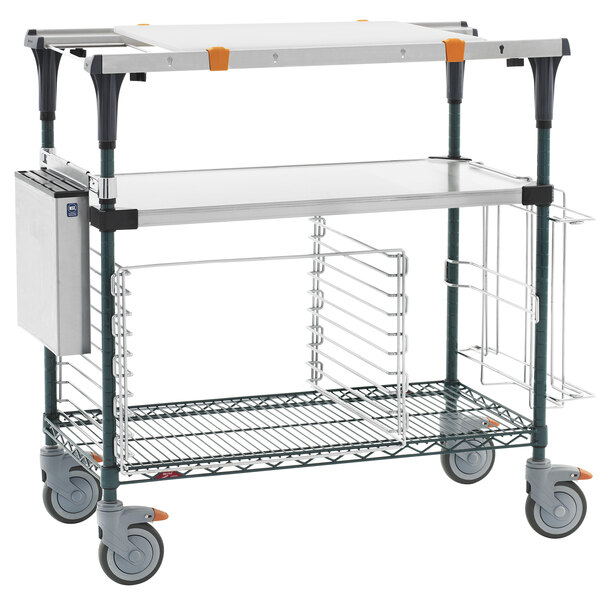 A Metro stainless steel cart with shelves and a tray.