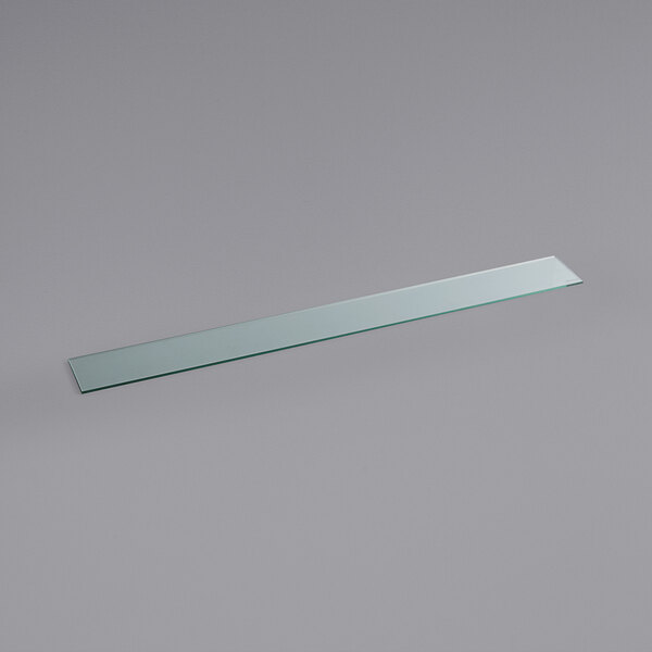 a glass rectangular object on a white background
