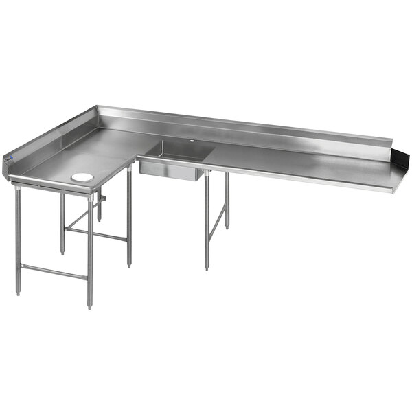 A stainless steel L-shape dishtable with a sink and drain on the left.