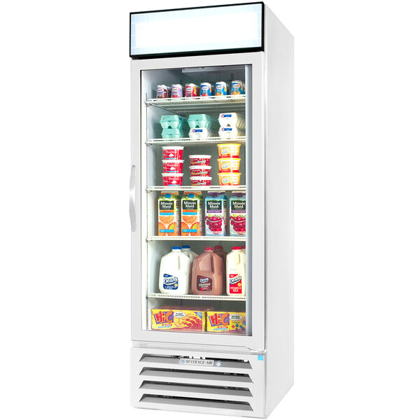 A Beverage-Air white refrigerated glass door merchandiser full of dairy products.