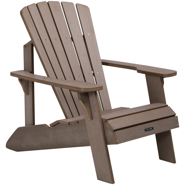 A Lifetime light brown wooden Adirondack chair with armrests.