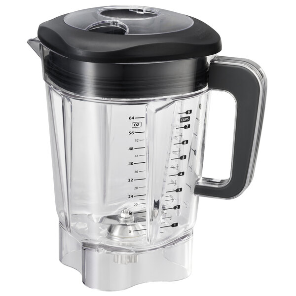 A clear Proctor Silex blender jar with a black lid and black handle.