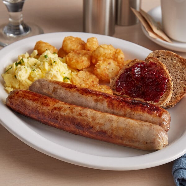 A plate of Warrington Farm Meats maple sausages, eggs, hashbrowns, toast and jam.