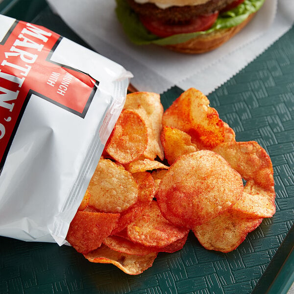 A Martin's bag of Red Hot Chips on a tray.