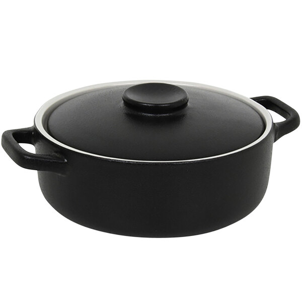 A black stoneware ovenware dish with a lid on top.
