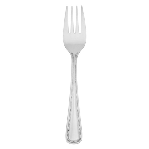 A Walco stainless steel salad fork with a beaded design on the handle.