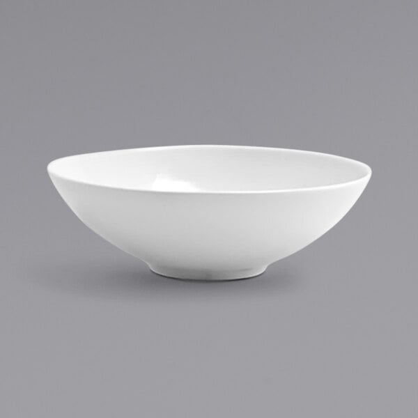 A Front of the House white porcelain wide bowl with a spiral pattern.