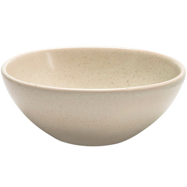 A white bowl with speckled mushroom-colored specks.