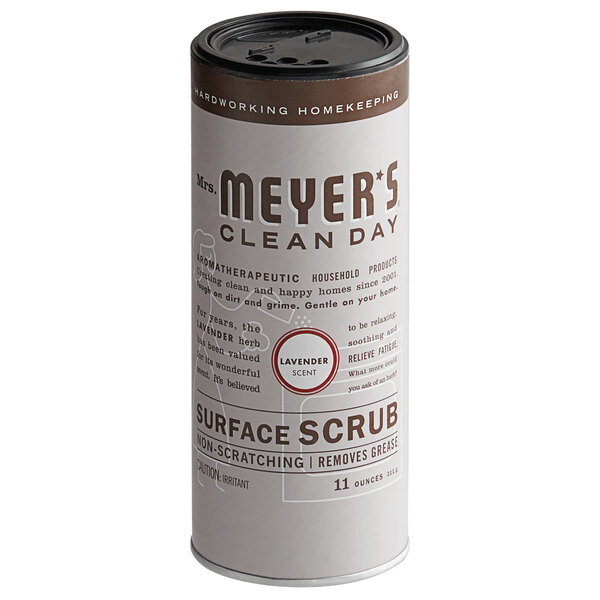 A white container of Mrs. Meyer's Clean Day lavender scrub with a black lid.