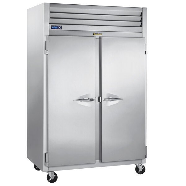 A large silver Traulsen G Series reach-in freezer with two doors.