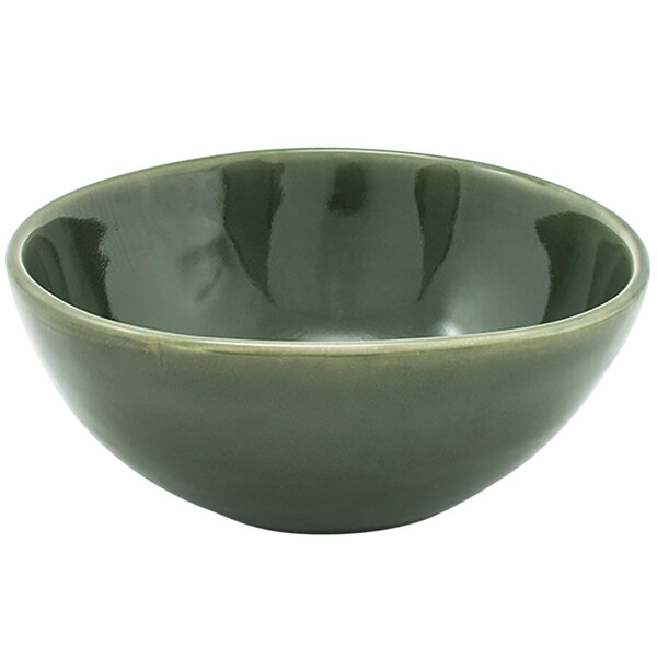 A close up of a green Front of the House Kiln oval porcelain bowl.