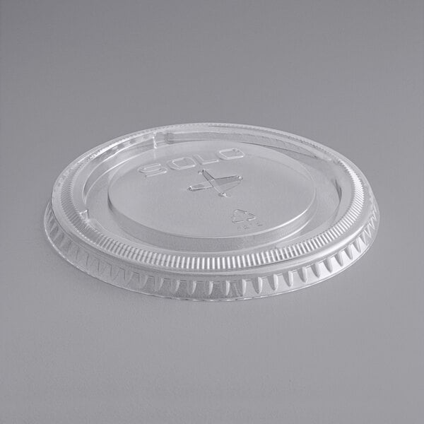Choice Clear Plastic Flat Lid with Straw Slot - 32 oz. - 500/Case