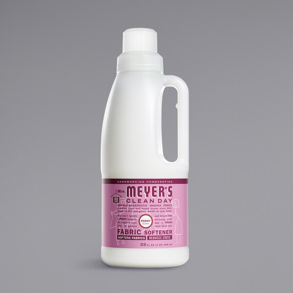 A white Mrs. Meyer's Clean Day fabric softener jug with a purple label.