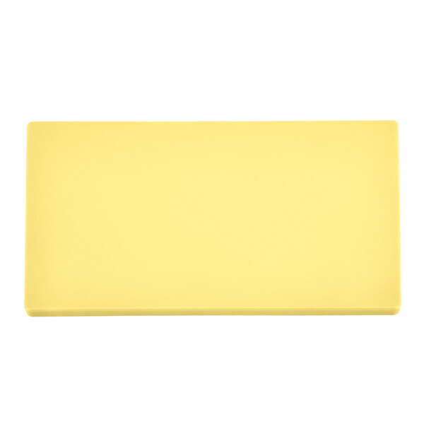 A yellow rectangular Vollrath cutting board.