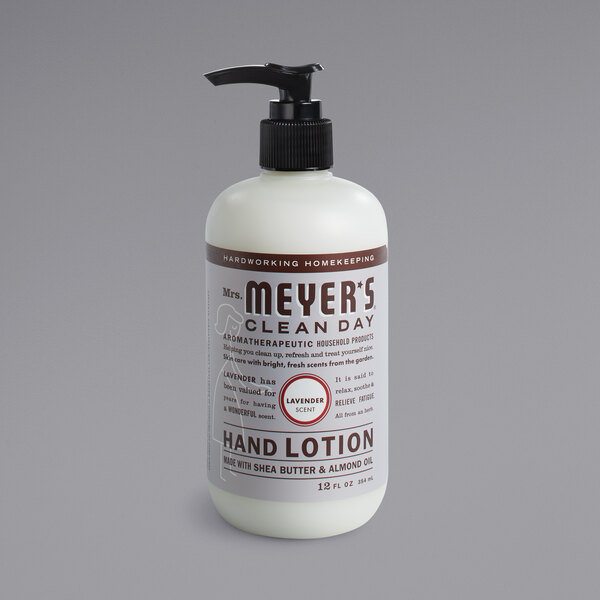 A white Mrs. Meyer's Clean Day lavender hand lotion bottle with a black pump and label on a counter.