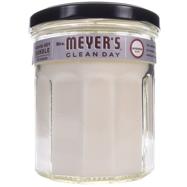 A case of 6 Mrs. Meyer's Clean Day lavender scented wax candles in glass jars.