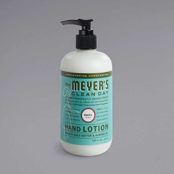 A white bottle of Mrs. Meyer's Basil Hand Lotion with a black pump.