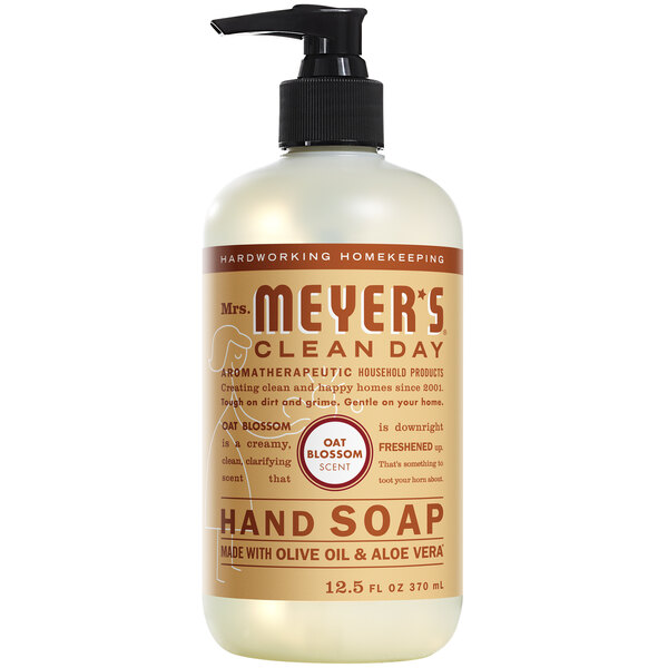 A Mrs. Meyer's Clean Day Oat Blossom scented hand soap bottle with a pump.