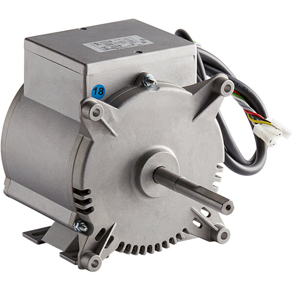 A grey electric motor with wires.
