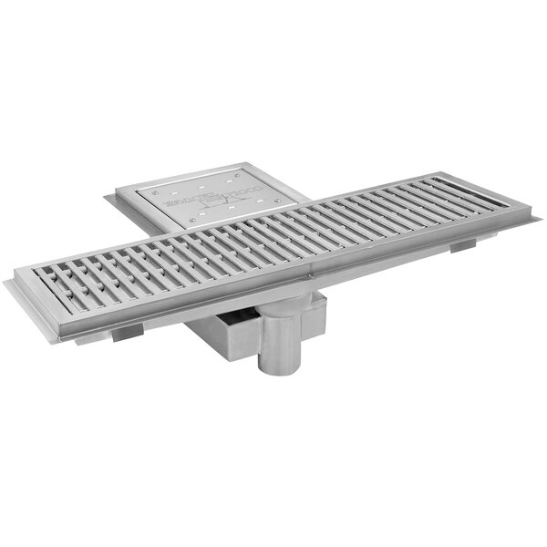 A stainless steel Eagle Group floor trough with a stainless steel grating cover.