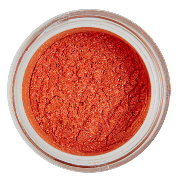 A jar of Roxy & Rich Carrot Lustre Dust, a red-orange powder.