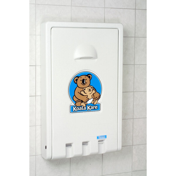 A white Koala Kare baby changing station with a teddy bear logo.