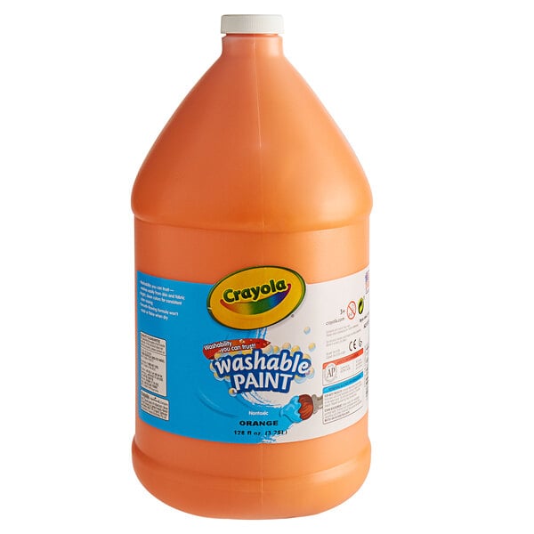 A large jug of Crayola orange liquid paint with a label.